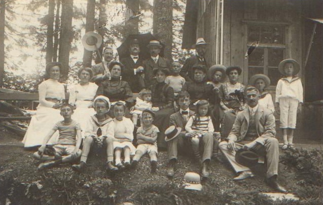 Some of the Dubravcic family. Zlata's father Ivan on the right, with Darinka, Ivo and Dinko behind him. Ivan's father is at the back with the umbrella